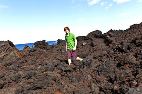 Boy in shorts volcano