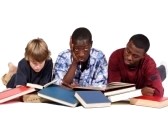 3 adolescent boys and books